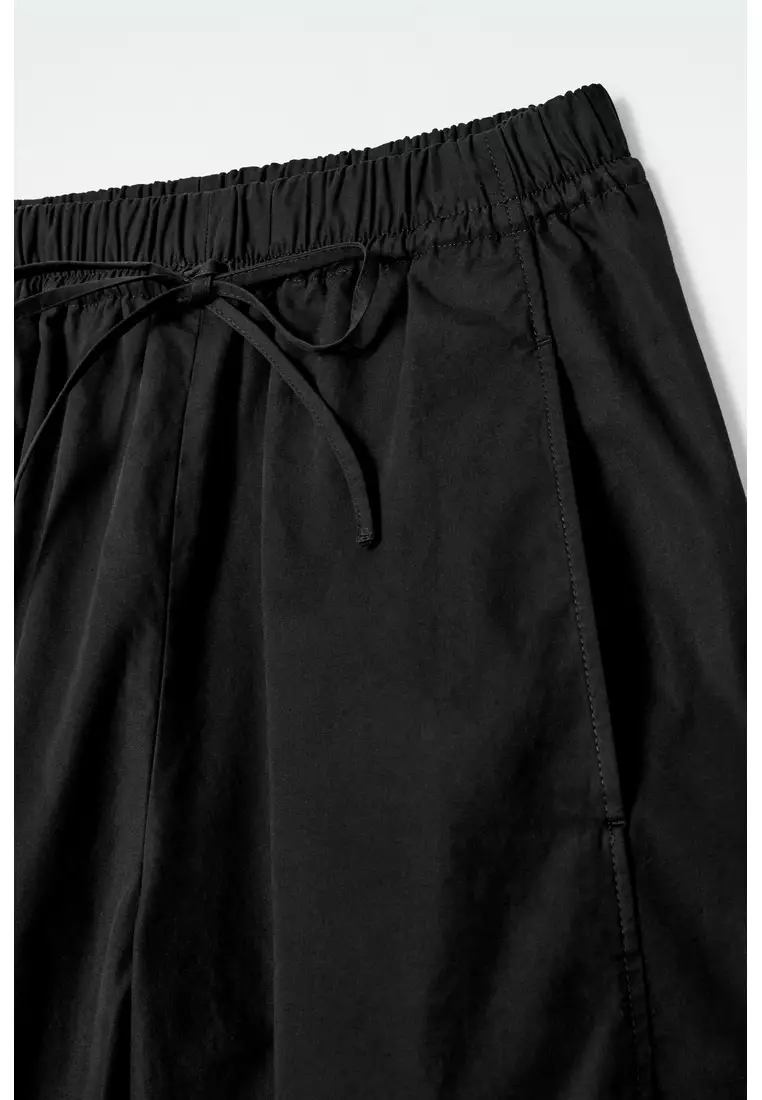 ELASTICATED BARREL-LEG TROUSERS
