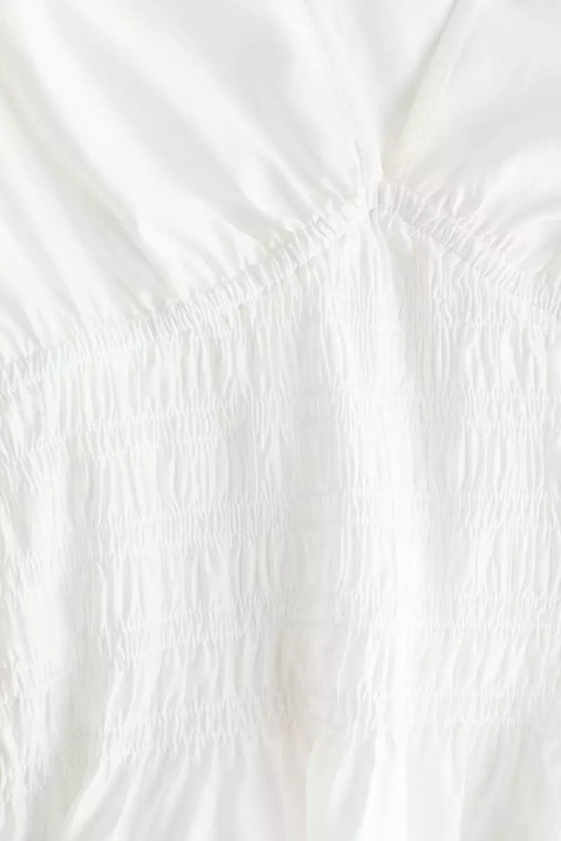 Smocked-waist blouse