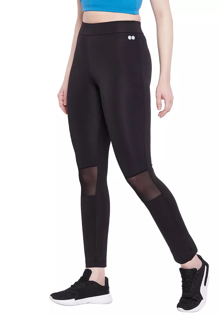 Clovia Snug Fit Active Tights in Black with Reflective Logo