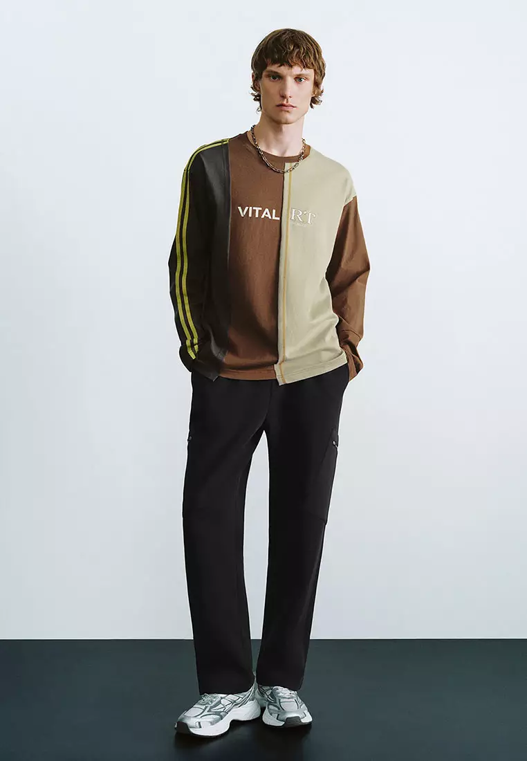 UR冬季新款男街头风解构设计感字母拼色长袖T恤UMV440158