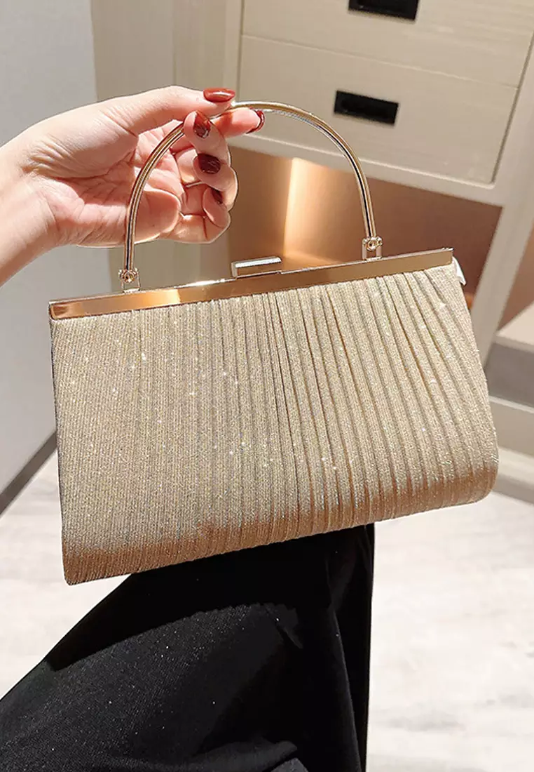 Shiny clutch hot sale bag