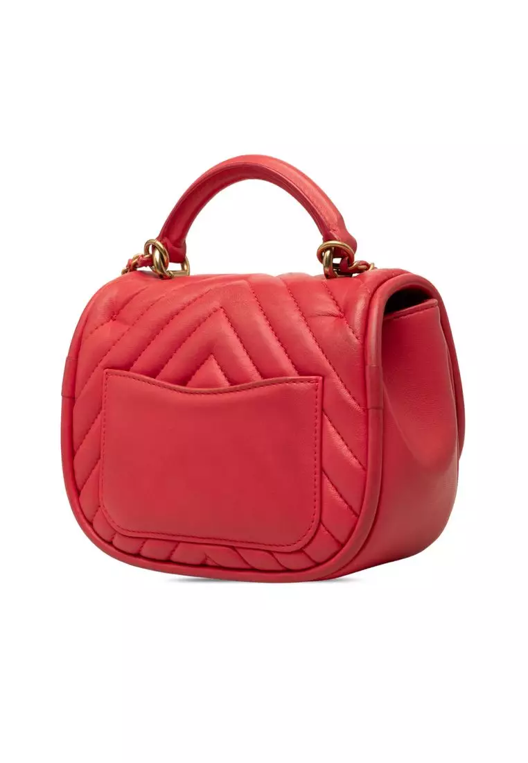 Pre-Loved Chanel Mini Cc Chevron Lambskin Reversed Round Flap