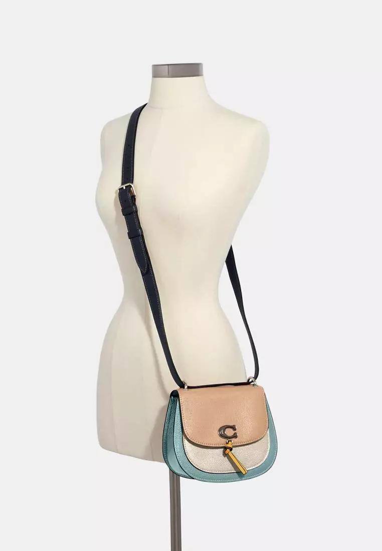 Remi saddle new arrivals bag coach