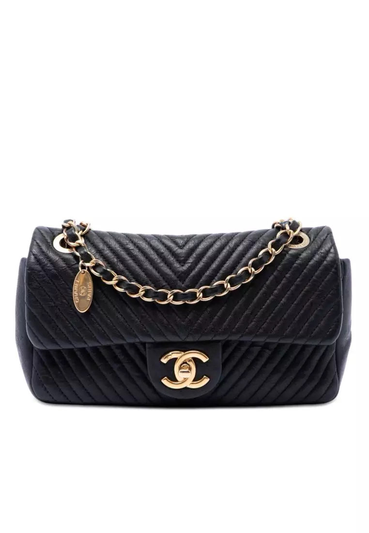 Pre-Loved Chanel Small Chevron Wrinkled Calfskin Medallion Charm Surpique Flap