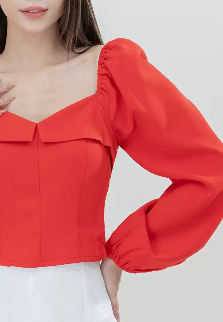 露腰感修身长袖上衣