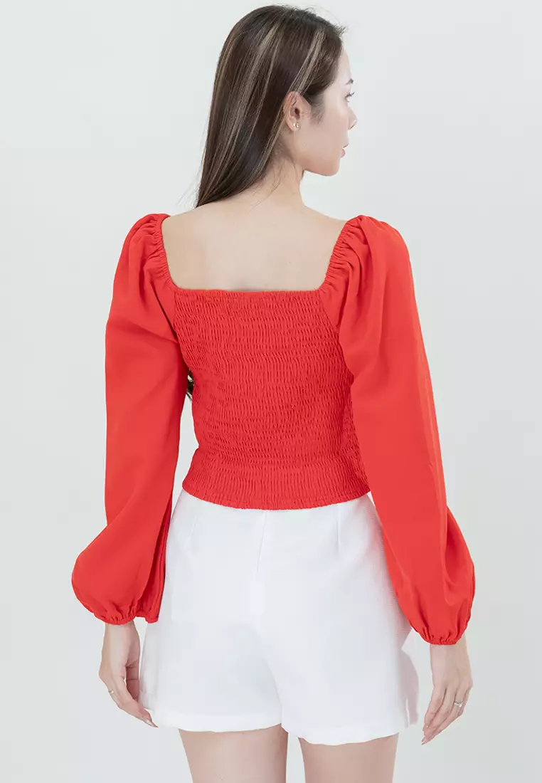 露腰感修身长袖上衣