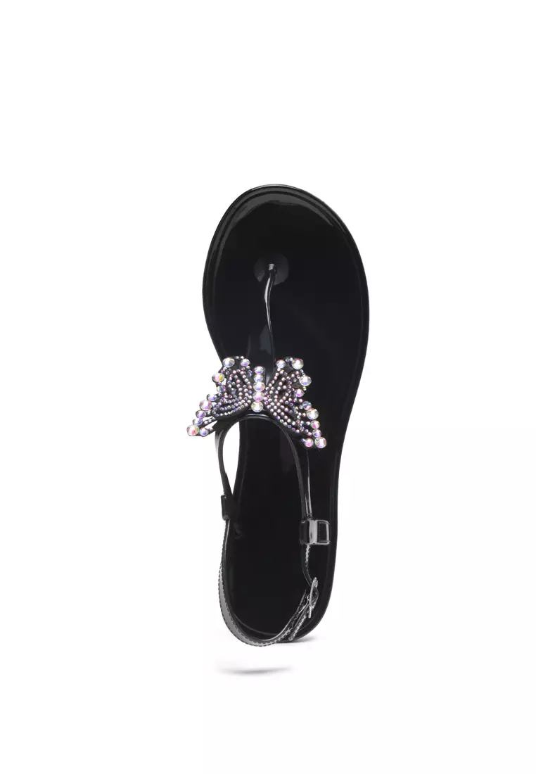 Butterfly T Strap Clear Flat Sandals in Black