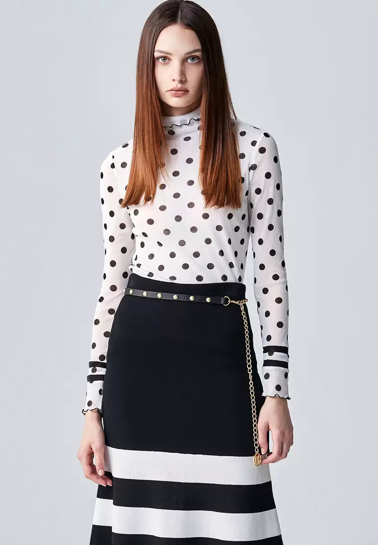 Black and white polka dot turtleneck top