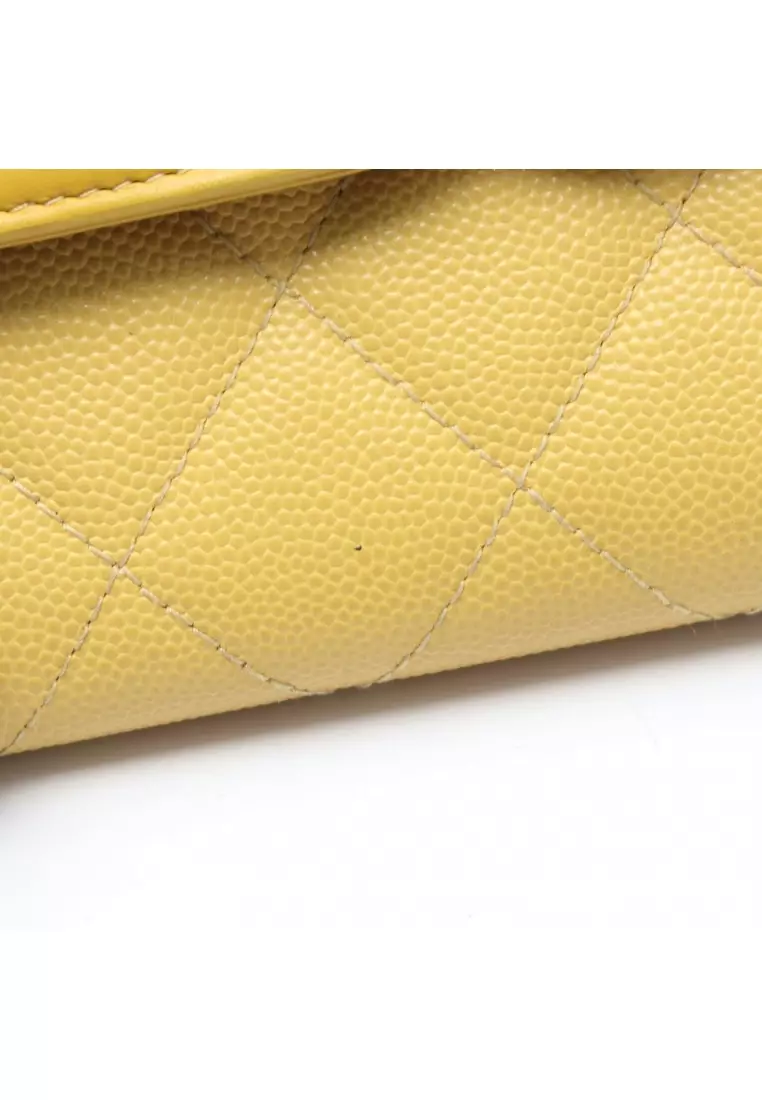 Pre-Loved Chanel CC filigree Bi-fold Long Wallet Caviar skin leather yellow gold hardware