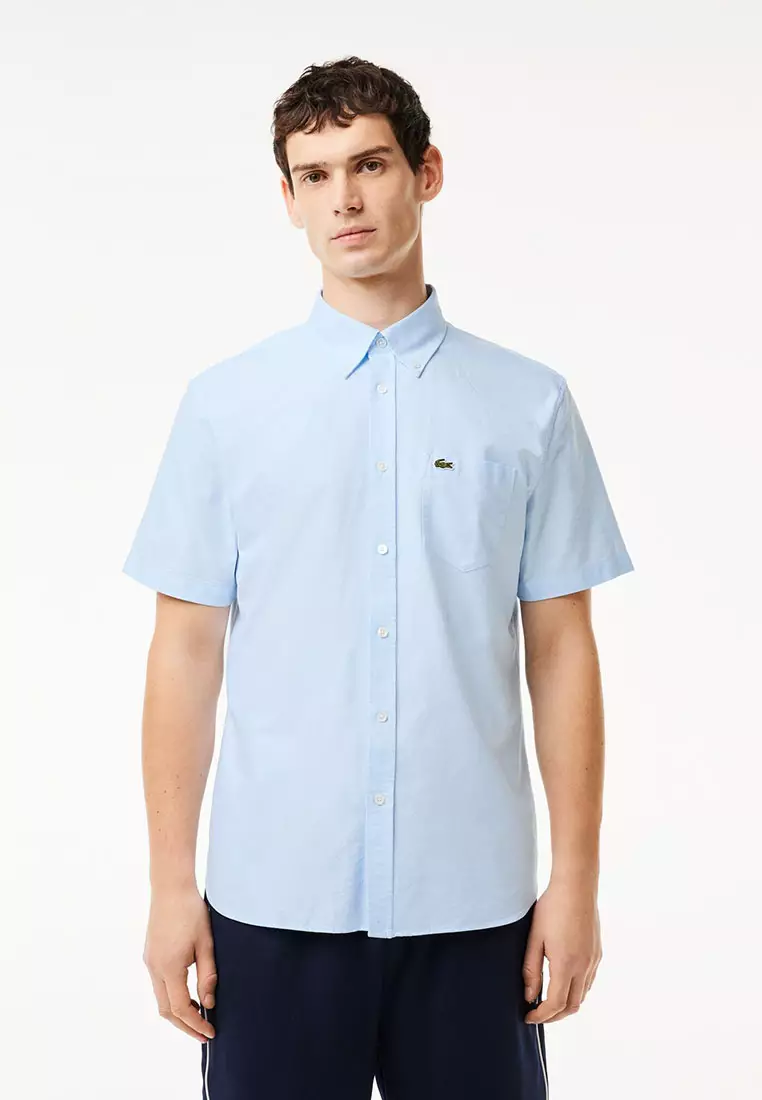 Tシャツ・カットソー ^LEATHERY^ Small Logo Oxford Shirt LIGHT BLUE LRSH5102LBL Buy Lacoste Regular Fit Short Sleeved Oxford Shirt 2025