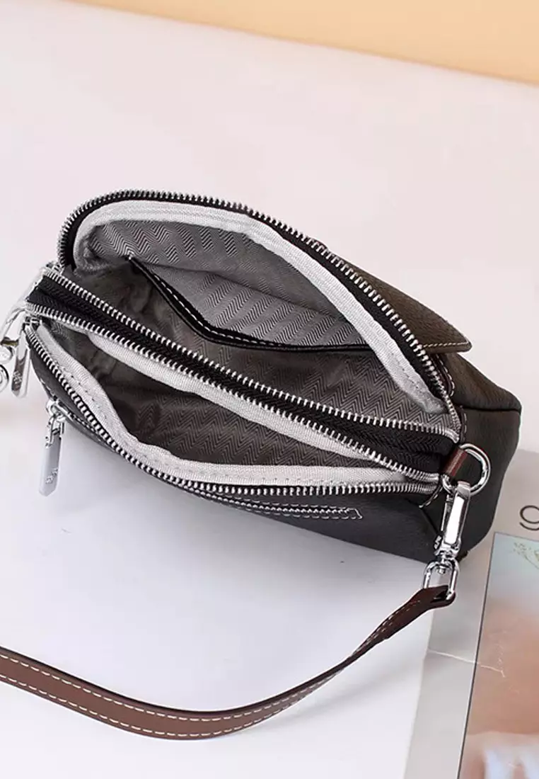 Litchi pattern head layer cowhide shoulder oblique backpack