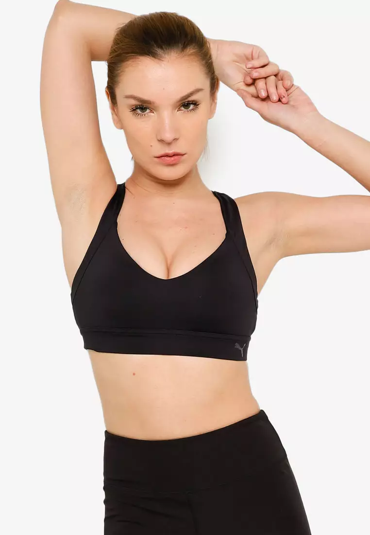 Puma mid-impact fit sports bra in black