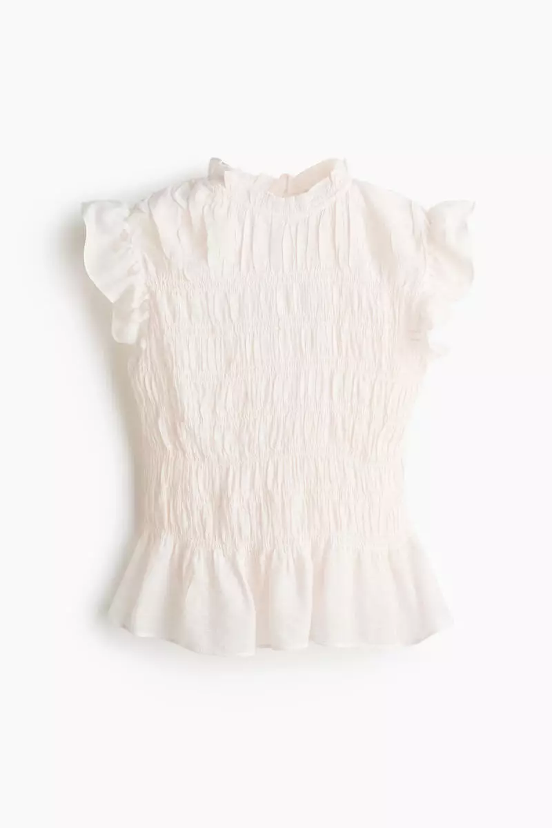 Smocked peplum top