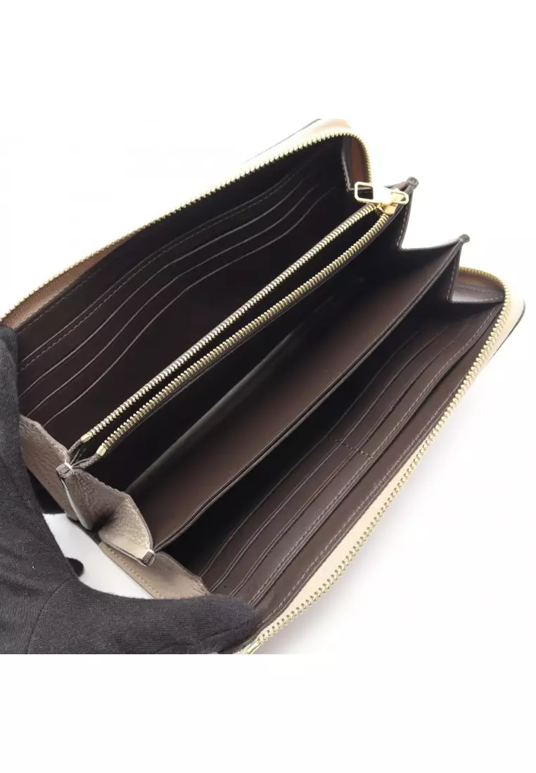 Pre-Loved Louis Vuitton Portefeuil comet Carré L-shaped zipper long wallet taurillon leather Gray beige