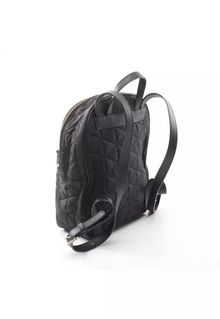 Black quilted online rucksack