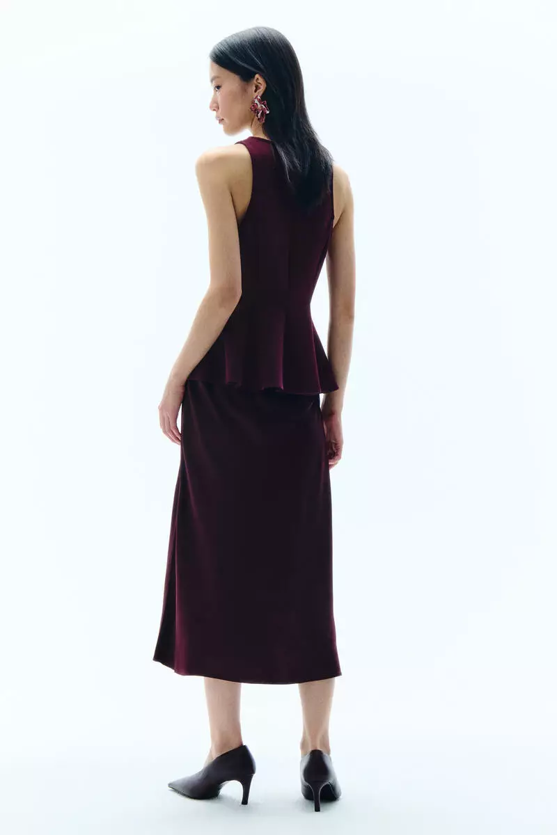 Sleeveless peplum top