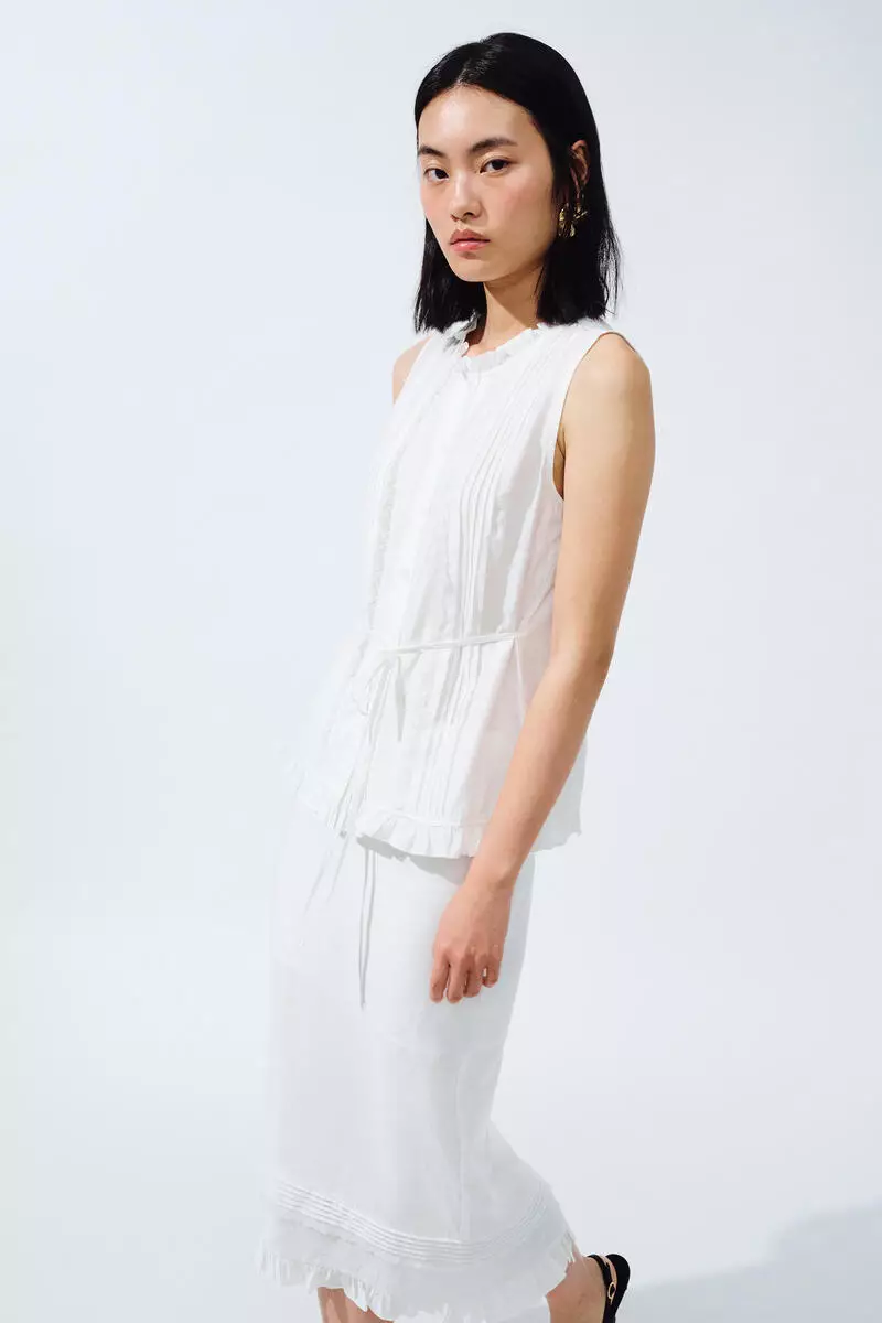Frill-trimmed button-front blouse