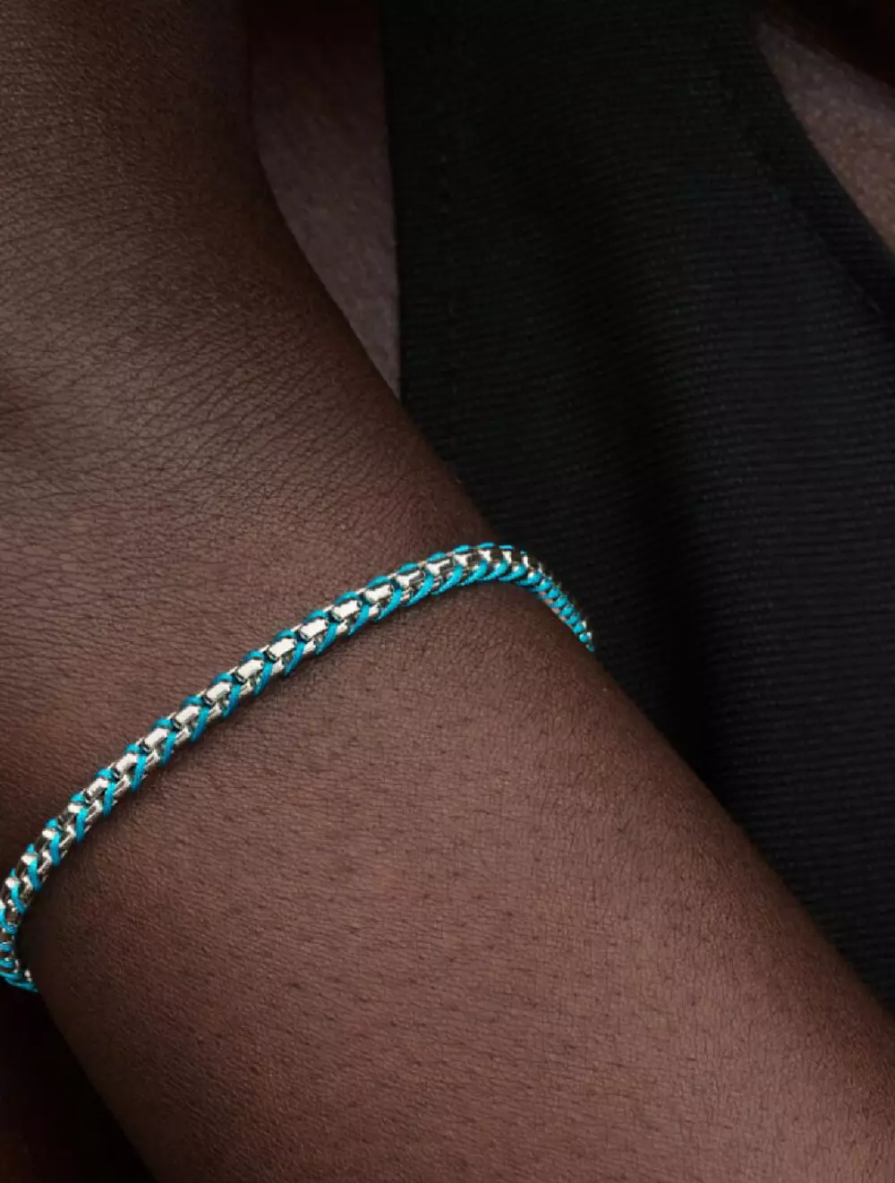 Braided sterling silver box chain bracelet with turquoise cord