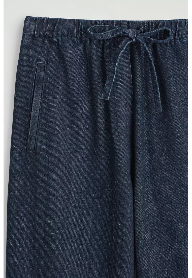CROPPED DENIM WIDE-LEG TROUSERS