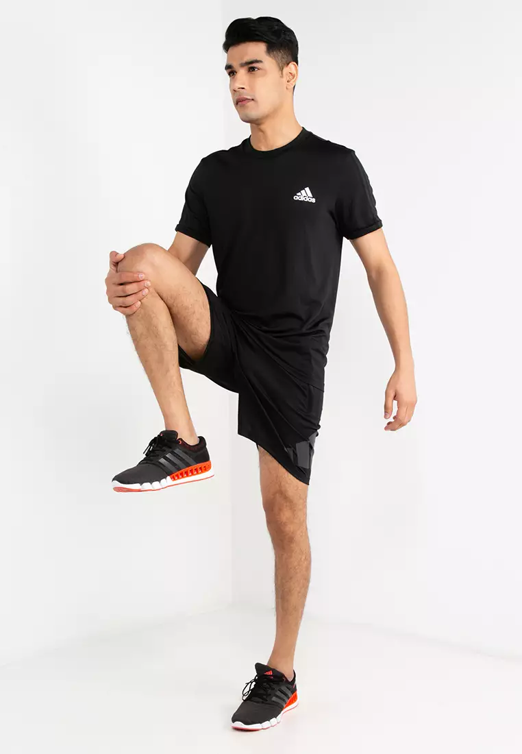train essentials logo training running shorts