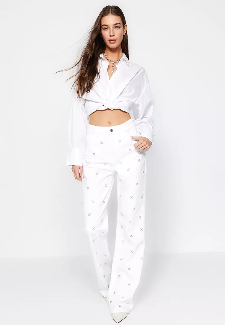 White jeans with embroidery on legs sales
