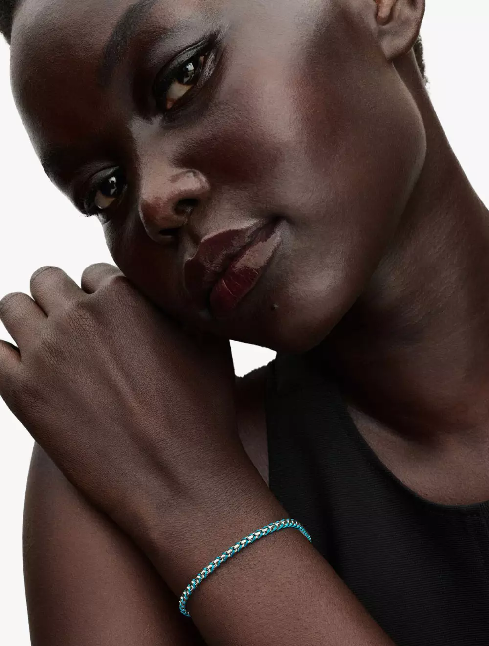 Braided sterling silver box chain bracelet with turquoise cord