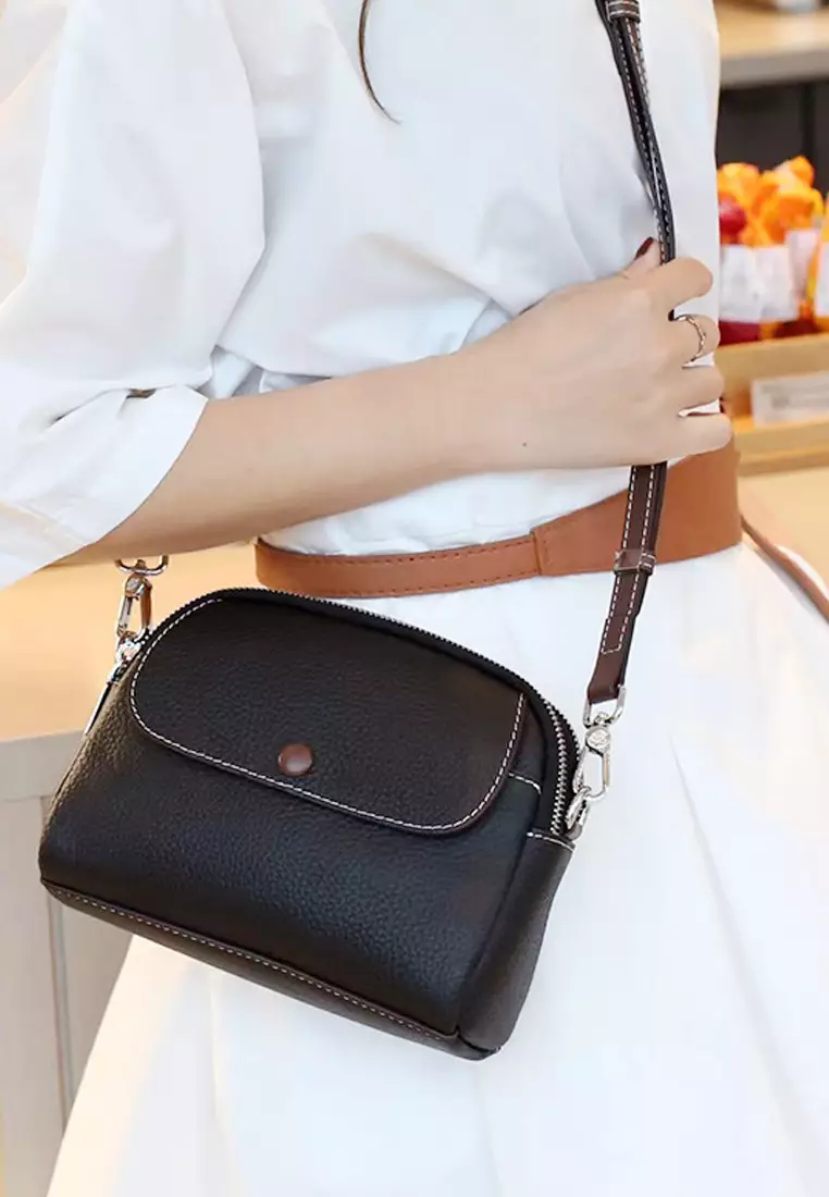 Litchi pattern head layer cowhide shoulder oblique backpack