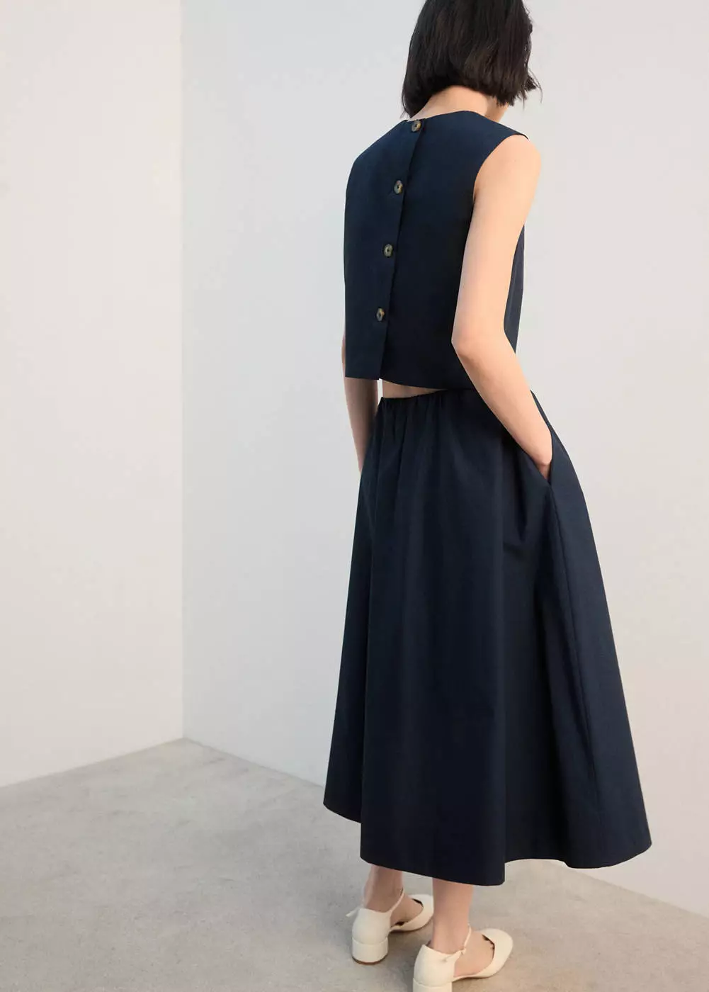 Rok midi katun berlipit