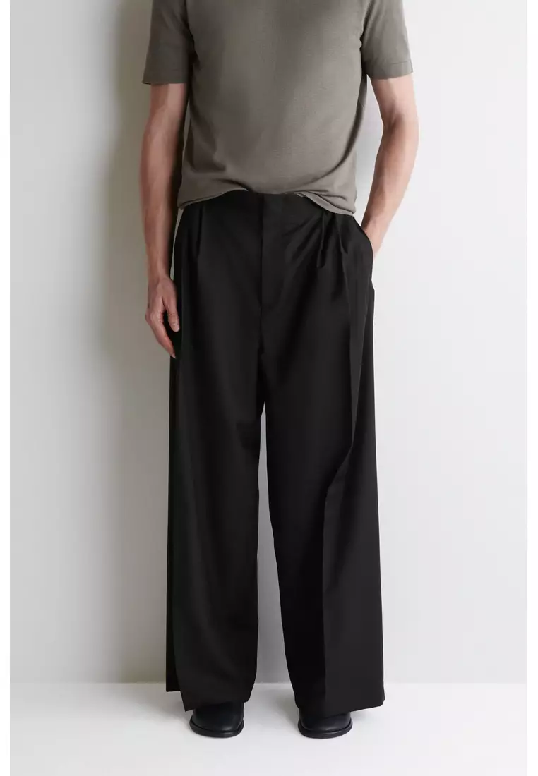 PLEATED WOOL WIDE-LEG TROUSERS