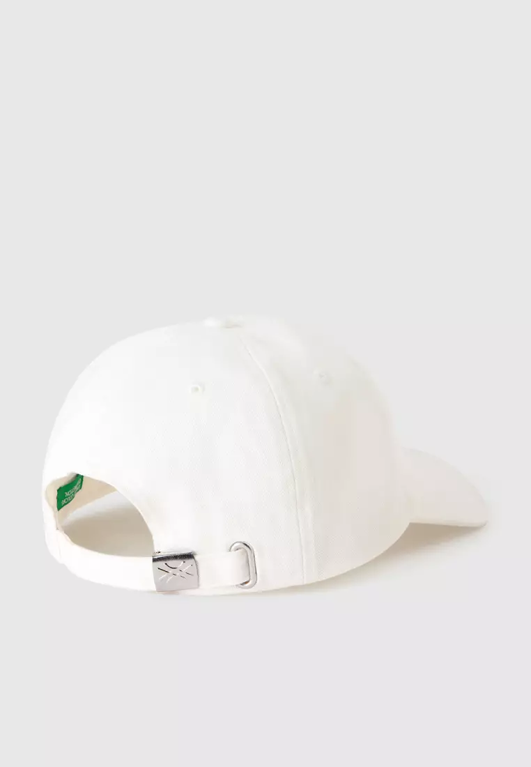 White cap with embroidered logo