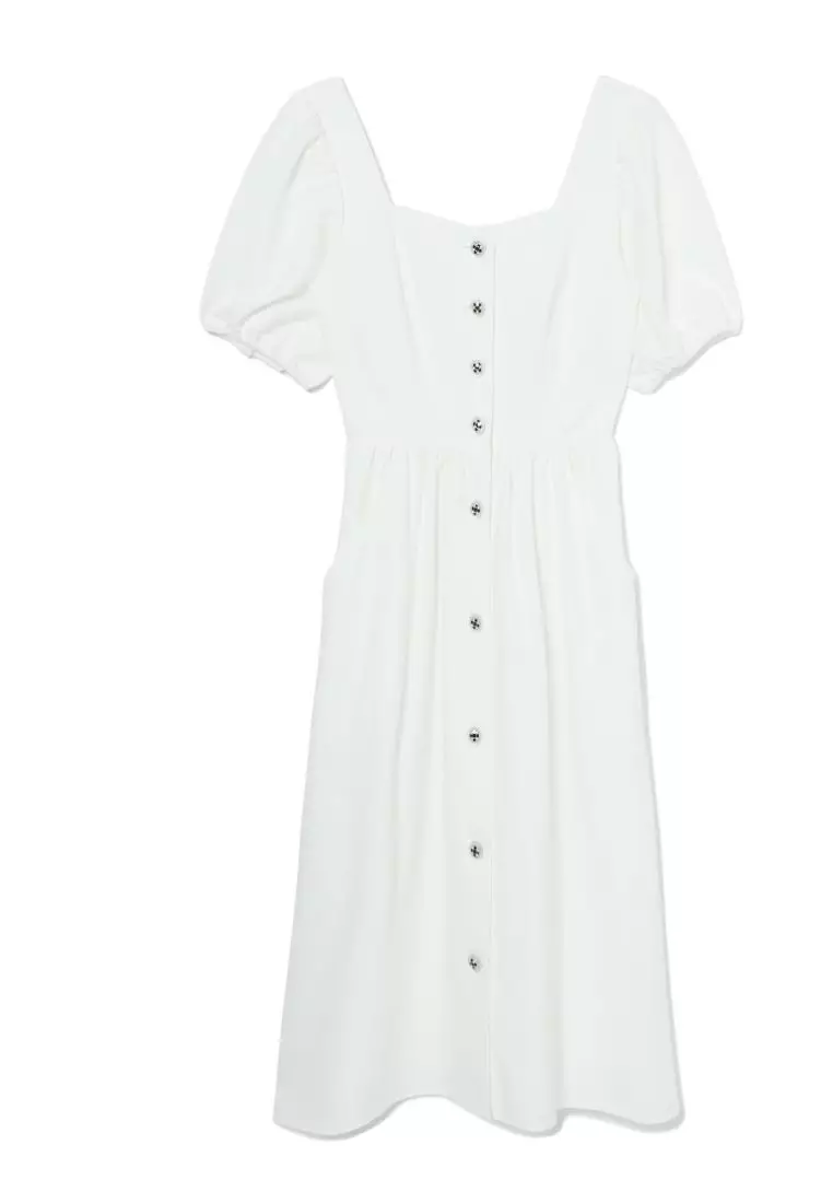 White dress with sale buttons down the front