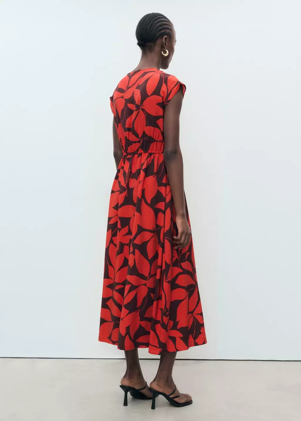 Gaun panjang bermotif