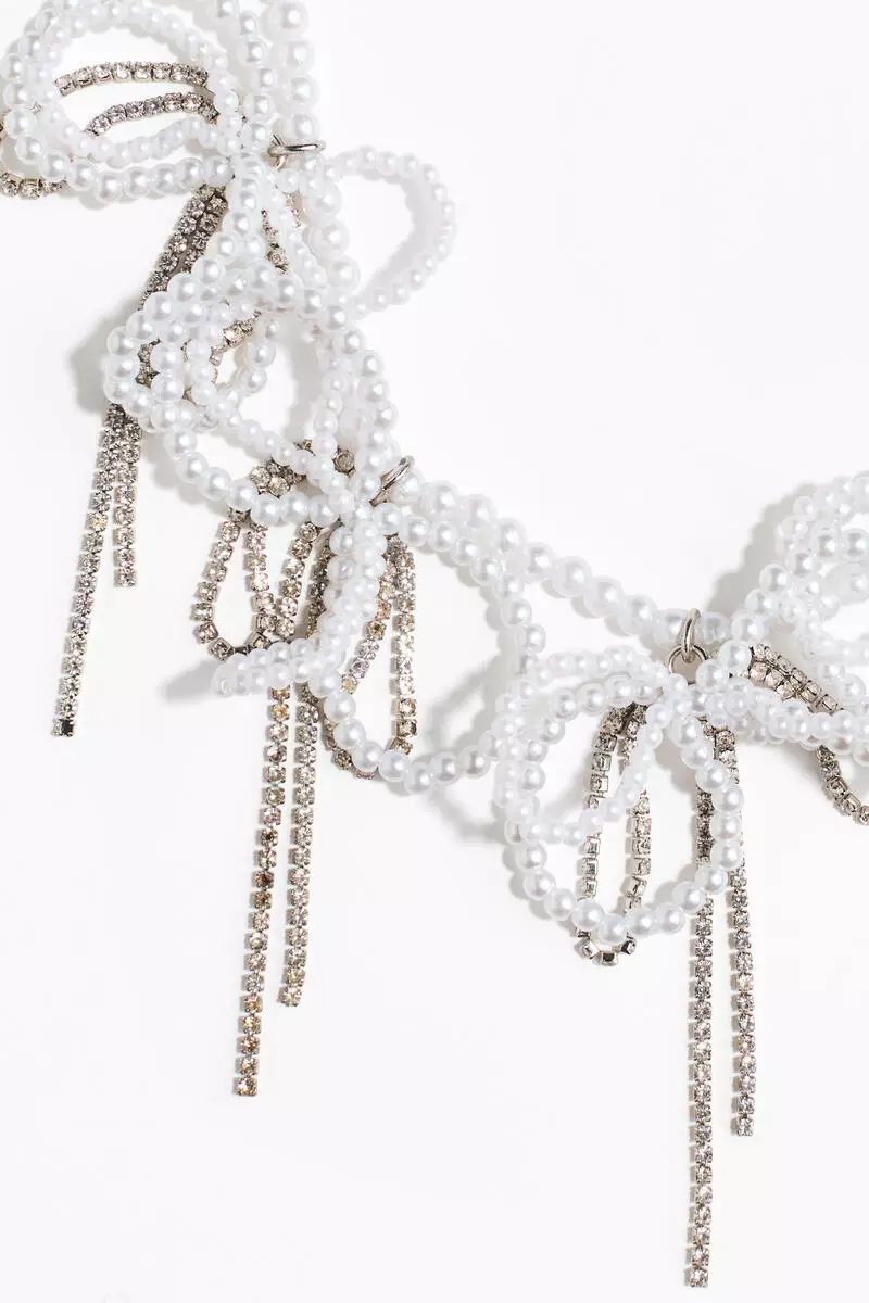 Beaded bow necklace