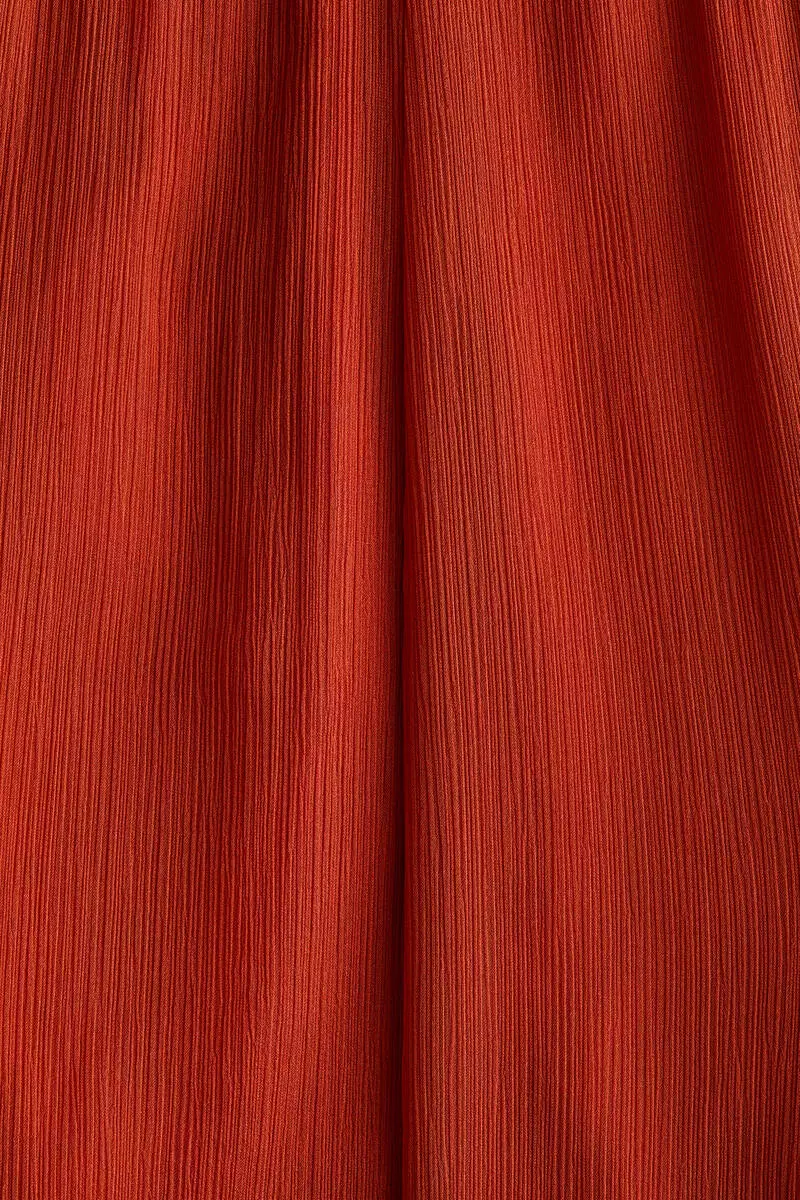 Flared crinkled trousers
