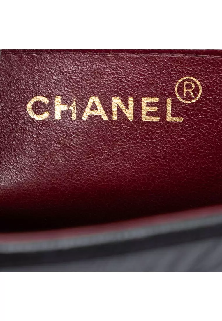 Pre-Loved Chanel Cc Vertical Quilt Lambskin Flap