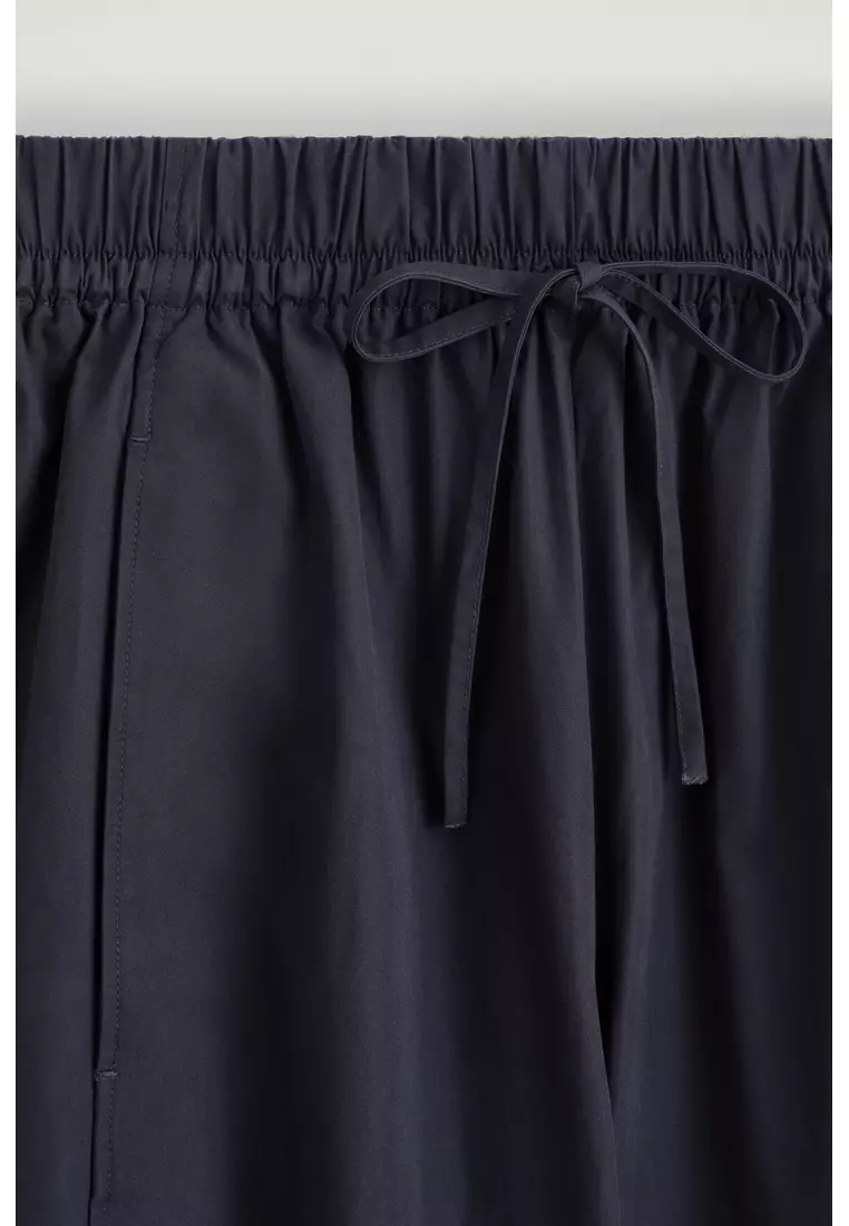 ELASTICATED BARREL-LEG TROUSERS