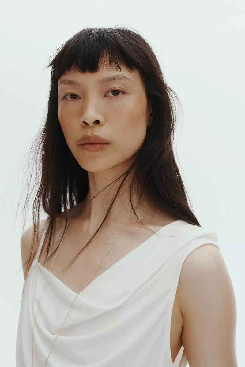 Draped asymmetric top