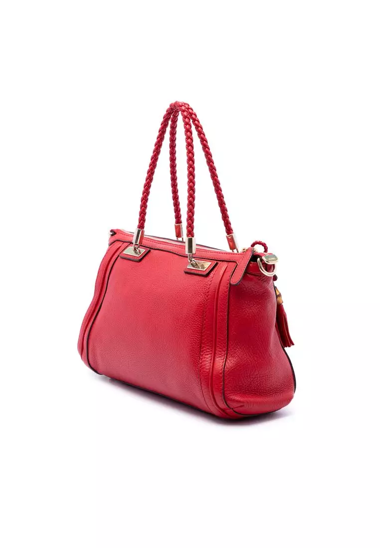 Pre-Loved Gucci Pebbled Calfskin Bella Satchel