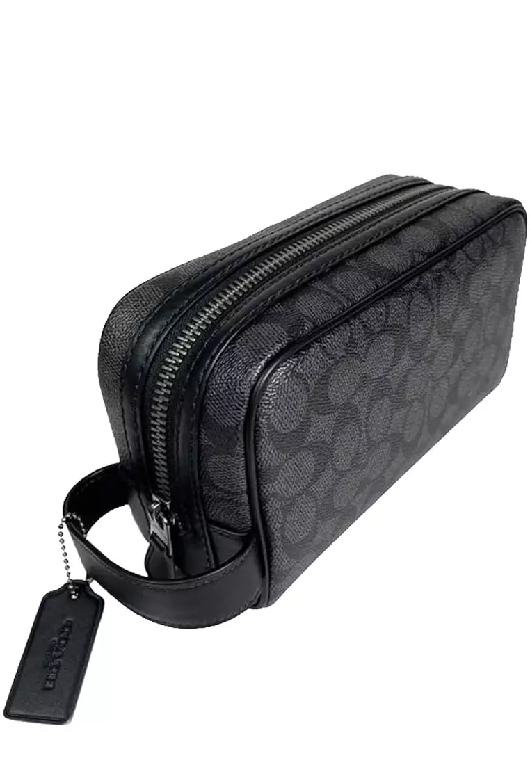 coach travel toiletry bag Purse: Brown Kit Signature coated canvas and smooth calf leather Inside multifunction pocket Zip closure fabric lining Handle with 2 1/4 drop Outside open pocket 8 3/4 (L) x 5 (H) x 3 1/4 (W) Style No. Vtg Rare/limited edition/hard to find