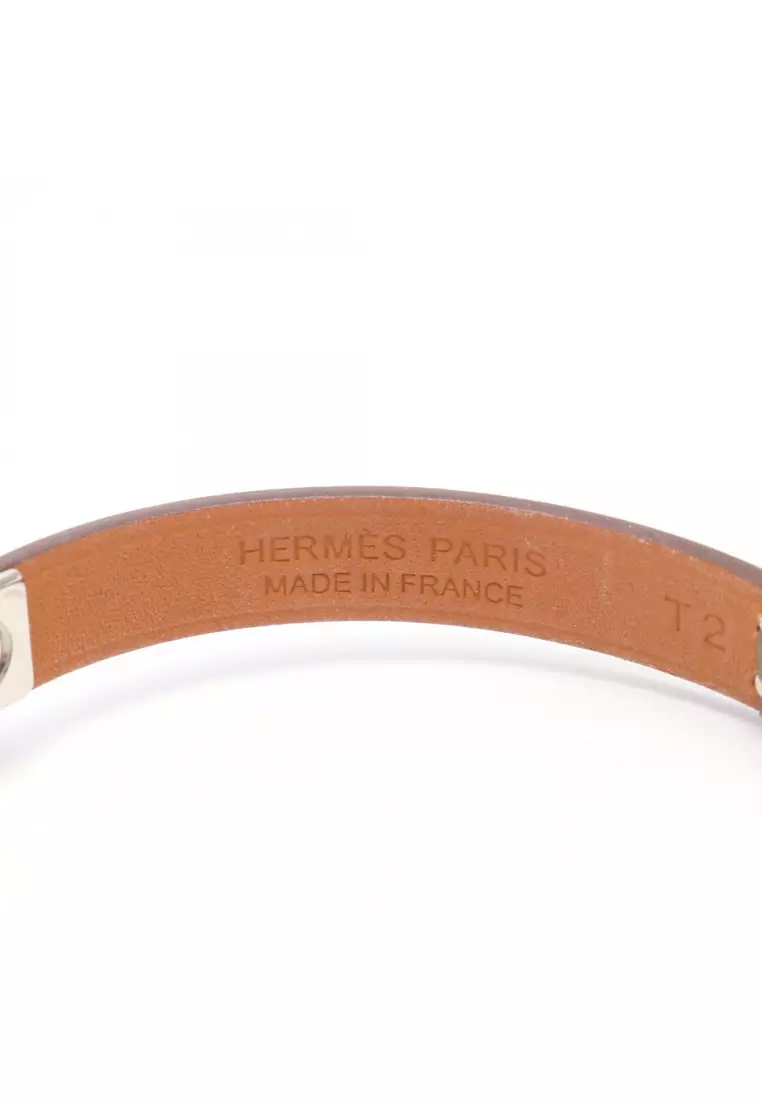 Pre-Loved Hermès Rival mini bracelet Veau Swift Gray brown U stamp
