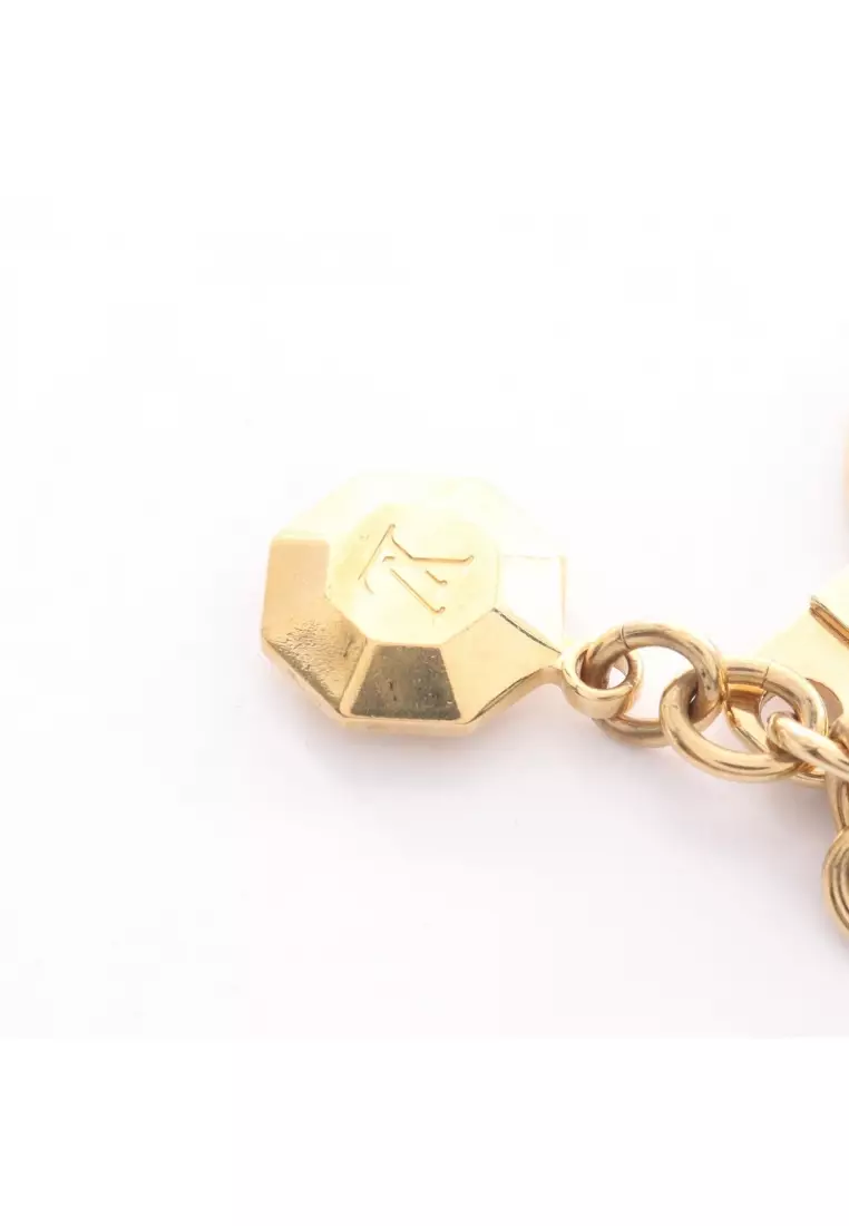 Pre-Loved Louis Vuitton Porto Kure cabochon key ring key ring GP gold pink beige