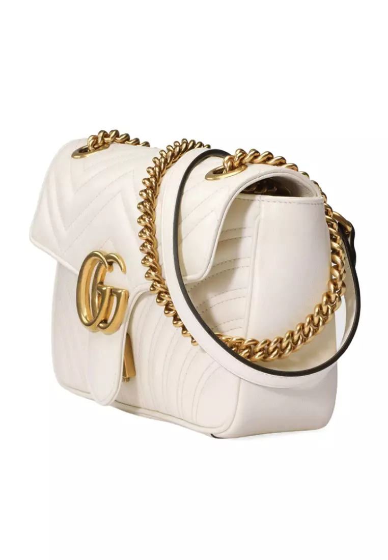 White gucci purse hot sale with gold chain