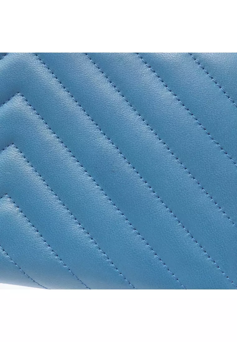 Pre-Loved Chanel Chevron V-stitch round zipper long wallet lambskin blue gold hardware