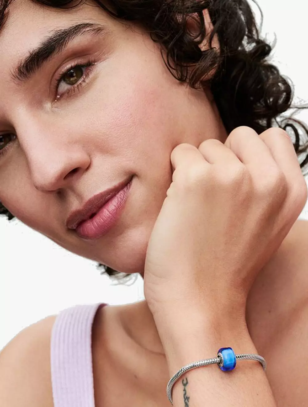 Sterling silver charm with blue Murano glass