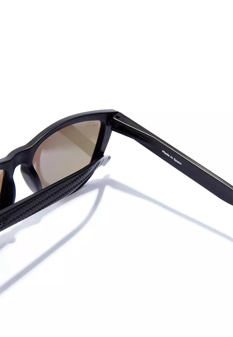 HAWKERS POLARIZED Daylight ONE CARBONO RAW. Sunglasses for Men and Women, Unisex. UV400 protection. Official product designed and made in Spain. HONR21NOTP