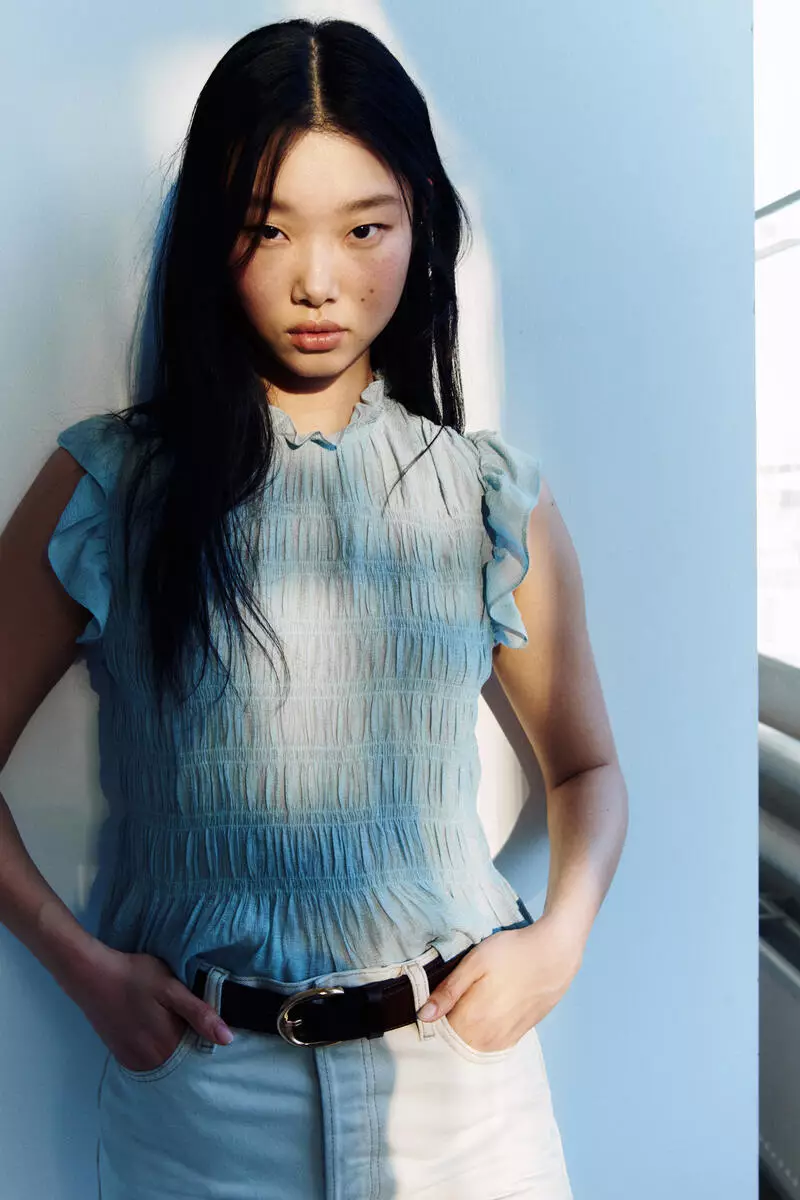Smocked peplum top