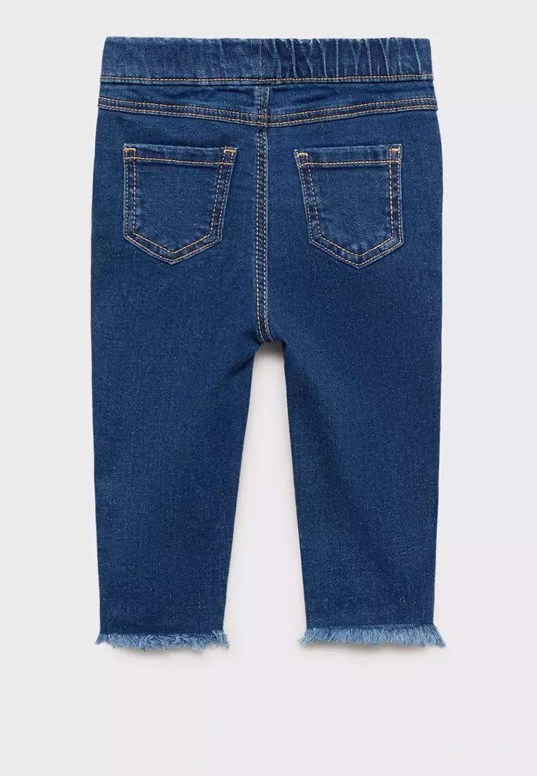 Skinny Jeans With Frayed Hem