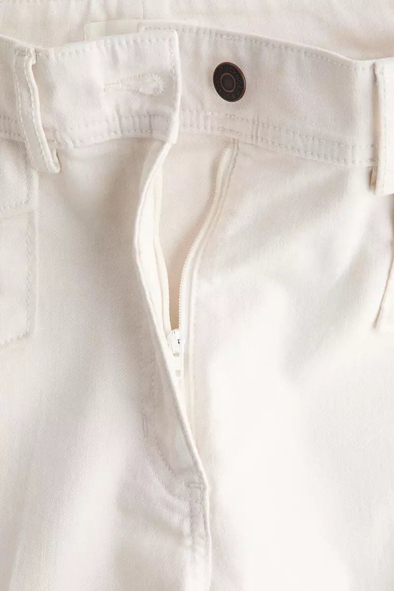 Flared ankle-length trousers