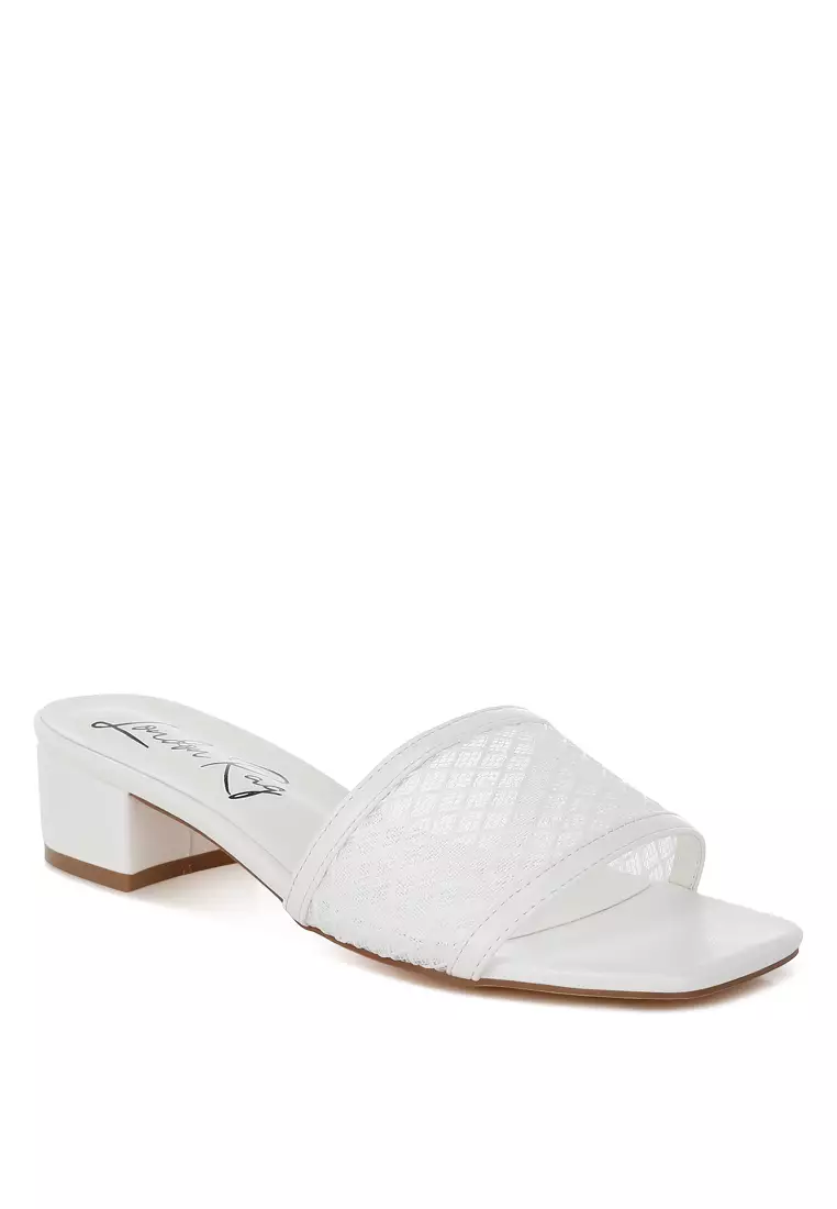 Sepatu hak rendah slip-on warna putih