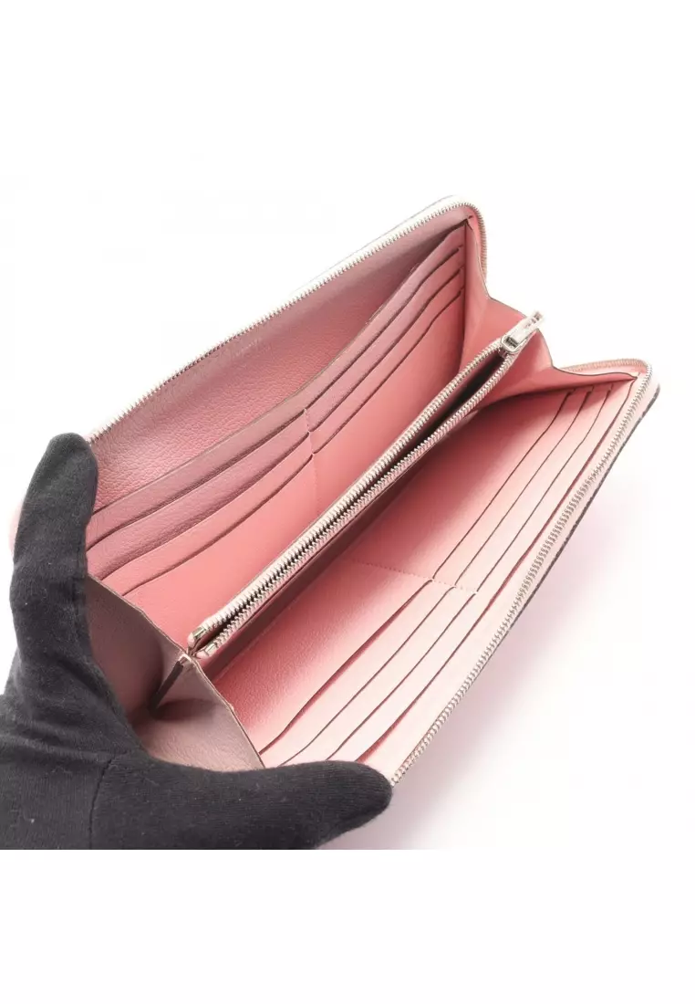 Pre-Loved Hermès Azap Long rose sakura round zipper long wallet Sikkim leather Light pink silver hardware T stamp
